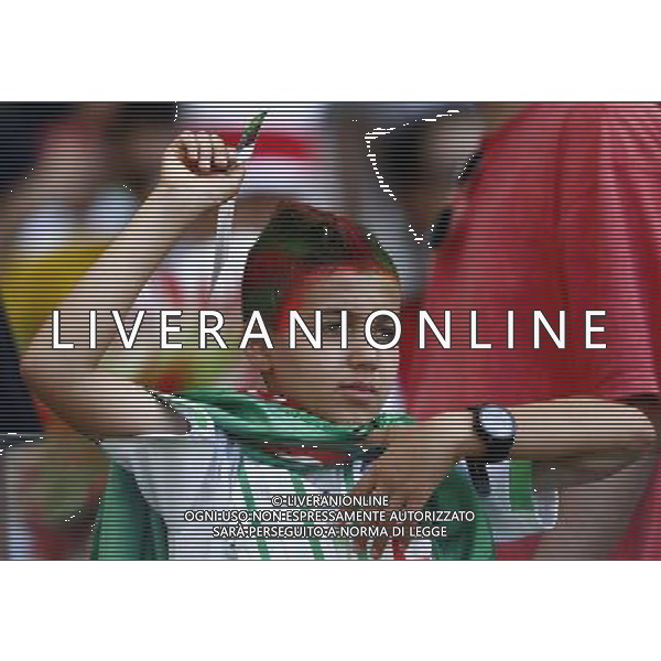 (140617) -- BELO HORIZONTE, June 17, 2014 () -- A fan of Algeria team cheers prior to a Group H match between Belgium and Algeria of 2014 FIFA World Cup at the Estadio Mineirao Stadium in Belo Horizonte, Brazil, June 17, 2014.(/Liu Bin)(xzj) AG ALDO LIVERANI SAS ONLY ITALY