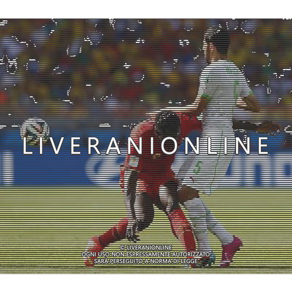 (140617) -- BELO HORIZONTE, June 17, 2014 () -- Algeria\'s Rafik Halliche (R) is blocked during a Group H match between Belgium and Algeria of 2014 FIFA World Cup at the Estadio Mineirao Stadium in Belo Horizonte, Brazil, June 17, 2014.(/Liu Bin)(xzj) AG ALDO LIVERANI SAS ONLY ITALY