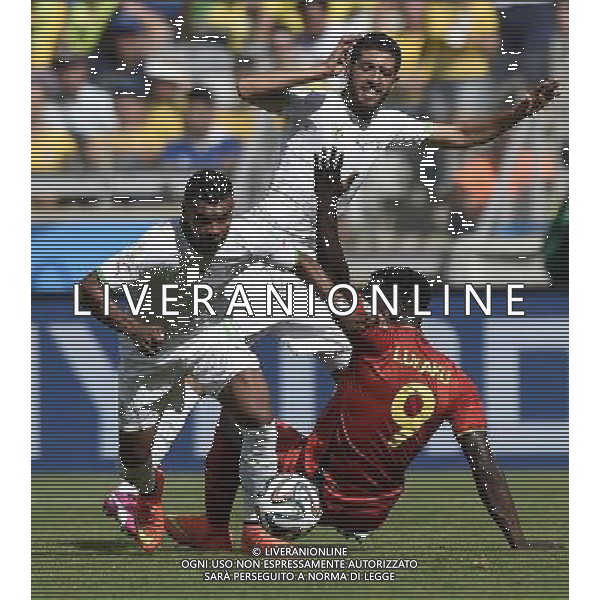 (140617) -- BELO HORIZONTE, June 17, 2014 () -- Belgium\'s Romelu Lukaku (R) vies with Algeria\'s Hilal Soudani (L) during a Group H match between Belgium and Algeria of 2014 FIFA World Cup at the Estadio Mineirao Stadium in Belo Horizonte, Brazil, June 17, 2014.(/Qi Heng)(rh) AG ALDO LIVERANI SAS ONLY ITALY
