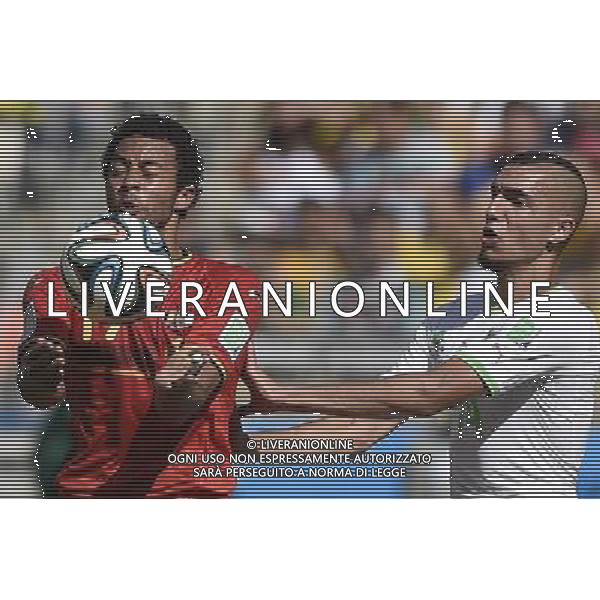 (140617) -- BELO HORIZONTE, June 17, 2014 () -- Belgium\'s Mousa Dembele (L) vies with Algeria\'s Nabil Bentaleb (R) during a Group H match between Belgium and Algeria of 2014 FIFA World Cup at the Estadio Mineirao Stadium in Belo Horizonte, Brazil, June 17, 2014.(/Qi Heng)(rh) AG ALDO LIVERANI SAS ONLY ITALY