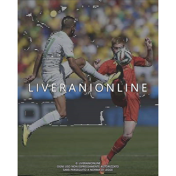 (140617) -- BELO HORIZONTE, June 17, 2014 () -- Belgium\'s Kevin De Bruyne (R) vies with Algeria\'s Riyad Mahrez (L) during a Group H match between Belgium and Algeria of 2014 FIFA World Cup at the Estadio Mineirao Stadium in Belo Horizonte, Brazil, June 17, 2014.(/Qi Heng)(rh) AG ALDO LIVERANI SAS ONLY ITALY