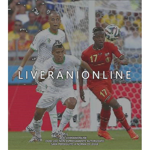 (140617) -- BELO HORIZONTE, June 17, 2014 () -- Belgium\'s Divock Origi (R, front) vies with Algeria\'s Saphir Taider (L, front) during a Group H match between Belgium and Algeria of 2014 FIFA World Cup at the Estadio Mineirao Stadium in Belo Horizonte, Brazil, June 17, 2014.(/Liu Bin)(xzj) AG ALDO LIVERANI SAS ONLY ITALY