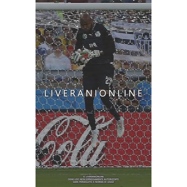 (140617) -- BELO HORIZONTE, June 17, 2014 () -- Algeria\'s goalkeeper Rais Mbolhi blocks the ball during a Group H match between Belgium and Algeria of 2014 FIFA World Cup at the Estadio Mineirao Stadium in Belo Horizonte, Brazil, June 17, 2014.(/Liu Bin)(xzj) AG ALDO LIVERANI SAS ONLY ITALY