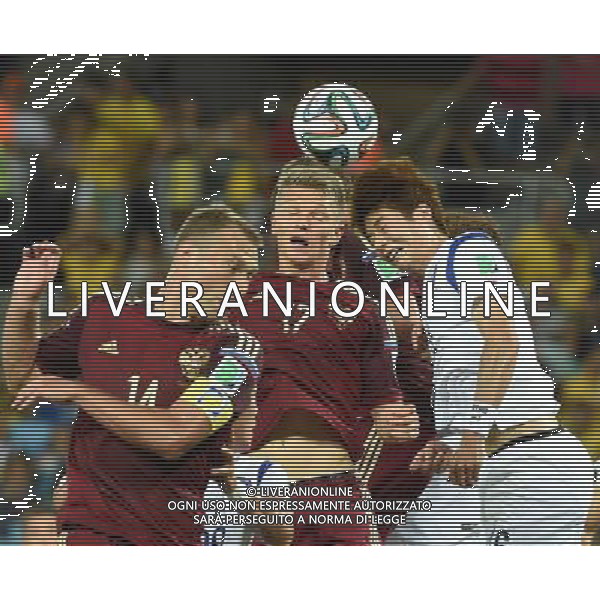 (140617) -- CUIABA, June 17, 2014 () -- Korea Republic\'s Ki Sung Yueng (R) competes for a header with Russia\'s Vasili Berezutskiy (L) and Oleg Shatov during a Group H match between Russia and Korea Republic of 2014 FIFA World Cup at the Arena Pantanal Stadium in Cuiaba, Brazil, June 17, 2014.(/Liu Dawei)(pcy) ©PHOTOSHOT/Agenzia Aldo Liverani sas - ITALY ONLY - EDITORIAL USE ONLY - Russia Vs Corea del Sud partita del Gruppo H Coppa del Mondo FIFA 2014 Pantanal stadio Arena di Cuiaba, Brasile, 17 giugno 2014