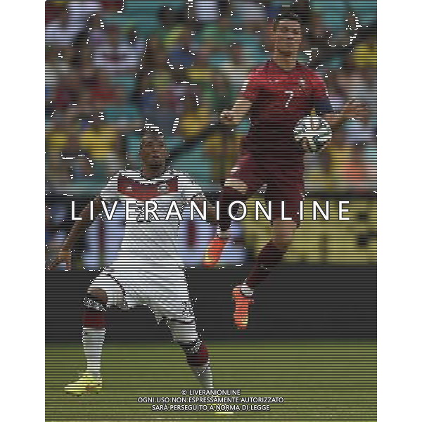 (140616) -- SALVADOR, June 16, 2014 () -- Portugal\'s Cristiano Ronaldo (R) competes with Germany\'s Jerome Boateng during a Group G match between Germany and Portugal of 2014 FIFA World Cup at the Arena Fonte Nova Stadium in Salvador, Brazil, June 16, 2014. (/Yang Lei)(xzj) ©PHOTOSHOT/Agenzia Aldo Liverani sas - ITALY ONLY - EDITORIAL USE ONLY - GERMANIA Vs PORTOGALLO partita del Gruppo G Coppa del Mondo 2014 FIFA World Cup presso l\'Arena Stadio Fonte Nova di Salvador, in Brasile, 16 giugno 2014