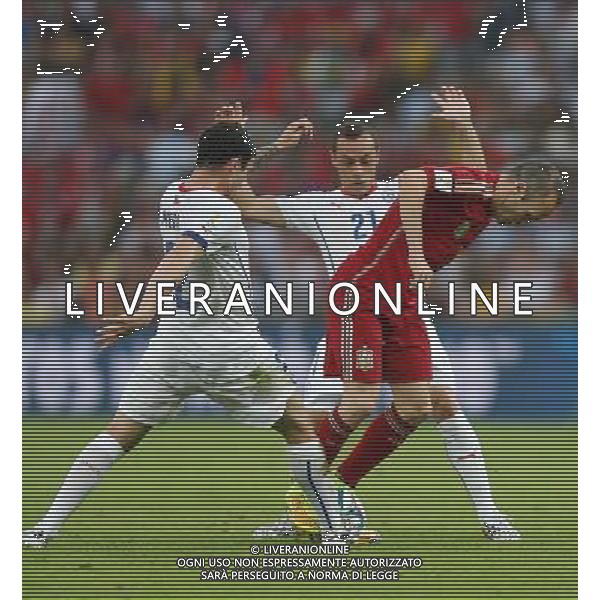 (140618) -- RIO DE JANEIRO, June 18, 2014 () -- Spain\'s Andres Iniesta (R) competes with Chile\'s Marcelo Diaz and Eugenio Mena (L) during a Group B match between Spain and Chile of 2014 FIFA World Cup at the Estadio do Maracana Stadium in Rio de Janeiro, Brazil, June 18, 2014. Chile won 2-0 over Spain on Wednesday.(/Wang Yuguo)(pcy) ©PHOTOSHOT/Agenzia Aldo Liverani sas - ITALY ONLY - EDITORIAL USE ONLY - Spagna Vs Cile partita del Gruppo B Coppa del Mondo 2014 FIFA a Estadio do Stadio Maracana\' di Rio de Janeiro, in Brasile, 18 Giugno 2014 il Cile ha vinto per 2-0 contro la Spagna