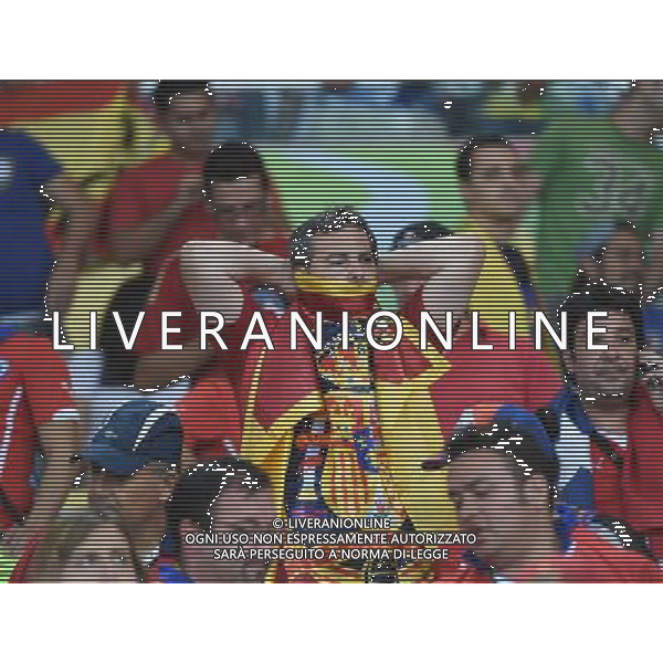 (140618) -- RIO DE JANEIRO, June 18, 2014 () -- A Spain\'s fan reacts after a Group B match between Spain and Chile of 2014 FIFA World Cup at the Estadio do Maracana Stadium in Rio de Janeiro, Brazil, June 18, 2014. Chile won 2-0 over Spain on Wednesday.(/Wang Yuguo)(pcy) ©PHOTOSHOT/Agenzia Aldo Liverani sas - ITALY ONLY - EDITORIAL USE ONLY - Spagna Vs Cile partita del Gruppo B Coppa del Mondo 2014 FIFA a Estadio do Stadio Maracana\' di Rio de Janeiro, in Brasile, 18 Giugno 2014 il Cile ha vinto per 2-0 contro la Spagna