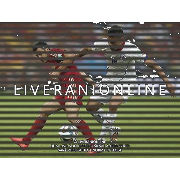 (140618) -- RIO DE JANEIRO, June 18, 2014 () -- Spain\'s Pedro Rodriguez vies with Chile\'s Gonzalo Jara during a Group B match between Spain and Chile of 2014 FIFA World Cup at the Estadio do Maracana Stadium in Rio de Janeiro, Brazil, June 18, 2014.(/Wang Lili)(rh) ©PHOTOSHOT/Agenzia Aldo Liverani sas - ITALY ONLY - EDITORIAL USE ONLY - Spagna Vs Cile partita del Gruppo B Coppa del Mondo 2014 FIFA a Estadio do Stadio Maracana\' di Rio de Janeiro, in Brasile, 18 Giugno 2014 il Cile ha vinto per 2-0 contro la Spagna