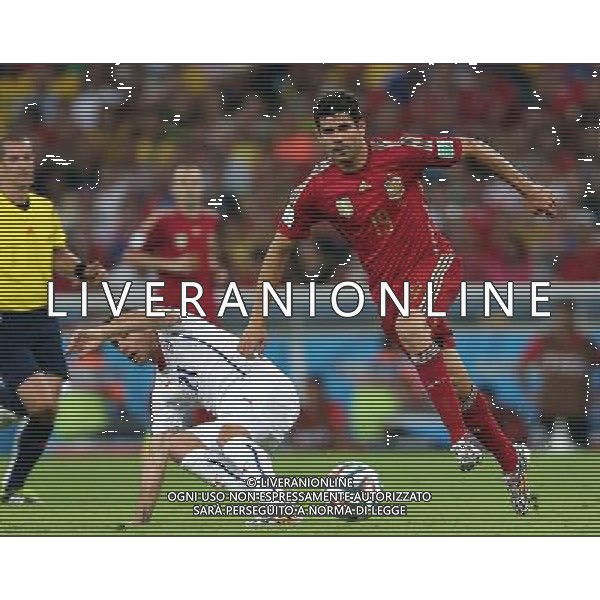 (140618) -- RIO DE JANEIRO, June 18, 2014 () -- Spain\'s Diego Costa (R) runs with the ball during a Group B match between Spain and Chile of 2014 FIFA World Cup at the Estadio do Maracana Stadium in Rio de Janeiro, Brazil, June 18, 2014.(/Xu Zijian)(pcy) ©PHOTOSHOT/Agenzia Aldo Liverani sas - ITALY ONLY - EDITORIAL USE ONLY - Spagna Vs Cile partita del Gruppo B Coppa del Mondo 2014 FIFA a Estadio do Stadio Maracana\' di Rio de Janeiro, in Brasile, 18 Giugno 2014 il Cile ha vinto per 2-0 contro la Spagna