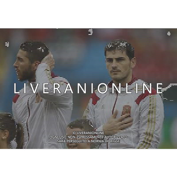 (140618) -- RIO DE JANEIRO, June 18, 2014 () -- Spain\'s goalkeeper Iker Casillas (R) sings Spanish national anthem during a Group B match between Spain and Chile of 2014 FIFA World Cup at the Estadio do Maracana Stadium in Rio de Janeiro, Brazil, June 18, 2014.(/Wang Lili)(rh) ©PHOTOSHOT/Agenzia Aldo Liverani sas - ITALY ONLY - EDITORIAL USE ONLY - Spagna Vs Cile partita del Gruppo B Coppa del Mondo 2014 FIFA a Estadio do Stadio Maracana\' di Rio de Janeiro, in Brasile, 18 Giugno 2014 il Cile ha vinto per 2-0 contro la Spagna