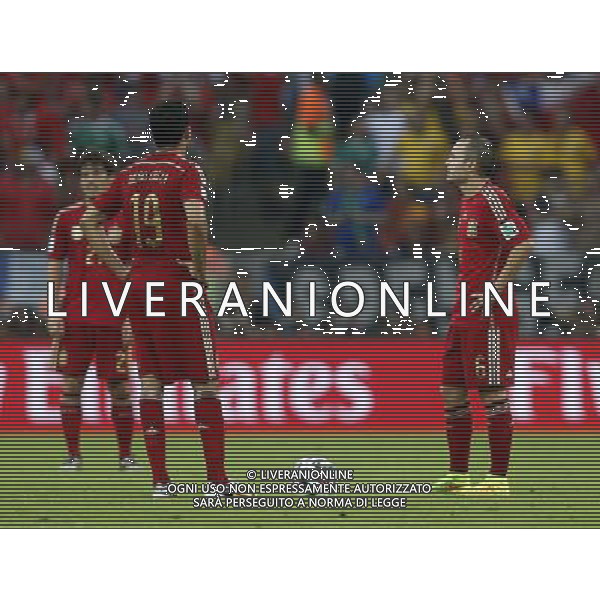 (140618) -- RIO DE JANEIRO, June 18, 2014 () -- Spain\'s players react during a Group B match between Spain and Chile of 2014 FIFA World Cup at the Estadio do Maracana Stadium in Rio de Janeiro, Brazil, June 18, 2014.(/Wang Lili)(rh) ©PHOTOSHOT/Agenzia Aldo Liverani sas - ITALY ONLY - EDITORIAL USE ONLY - Spagna Vs Cile partita del Gruppo B Coppa del Mondo 2014 FIFA a Estadio do Stadio Maracana\' di Rio de Janeiro, in Brasile, 18 Giugno 2014 il Cile ha vinto per 2-0 contro la Spagna