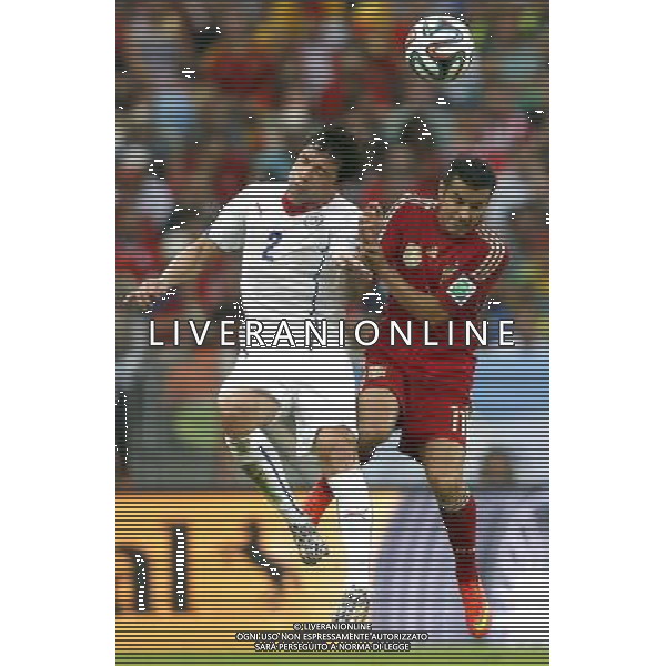 (140618) -- RIO DE JANEIRO, June 18, 2014 () -- Spain\'s Pedro Rodriguez vies with Chile\'s Eugenio Mena during a Group B match between Spain and Chile of 2014 FIFA World Cup at the Estadio do Maracana Stadium in Rio de Janeiro, Brazil, June 18, 2014.(/Wang Lili)(rh) ©PHOTOSHOT/Agenzia Aldo Liverani sas - ITALY ONLY - EDITORIAL USE ONLY - Spagna Vs Cile partita del Gruppo B Coppa del Mondo 2014 FIFA a Estadio do Stadio Maracana\' di Rio de Janeiro, in Brasile, 18 Giugno 2014 il Cile ha vinto per 2-0 contro la Spagna