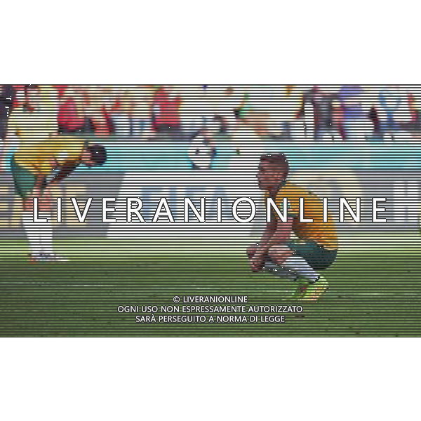 (140618) -- PORTO ALEGRE, June 18, 2014 () -- Australia\'s Oliver Bozanic (R) reacts after a Group B match between Australia and Netherlands of 2014 FIFA World Cup at the Estadio Beira-Rio Stadium in Porto Alegre, Brazil, June 18, 2014. Netherlands won 3-2 over Australia on Wednesday. (/Li Ga)(pcy) ©PHOTOSHOT/Agenzia Aldo Liverani sas - ITALY ONLY - EDITORIAL USE ONLY - Australia v Olanda partita del Gruppo B Coppa del Mondo FIFA 2014 Estadio Beira -Rio Stadium di Porto Alegre, in Brasile, 18 Giugno 2014. Olanda ha vinto per 3-2 contro l\'Australia