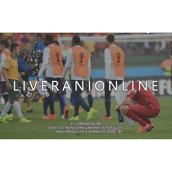 (140618) -- PORTO ALEGRE, June 18, 2014 () -- Australia\'s goalkeeper Mat Ryan (R) reacts after a Group B match between Australia and Netherlands of 2014 FIFA World Cup at the Estadio Beira-Rio Stadium in Porto Alegre, Brazil, June 18, 2014. Netherlands won 3-2 over Australia on Wednesday. (/Li Ga)(pcy) ©PHOTOSHOT/Agenzia Aldo Liverani sas - ITALY ONLY - EDITORIAL USE ONLY - Australia v Olanda partita del Gruppo B Coppa del Mondo FIFA 2014 Estadio Beira -Rio Stadium di Porto Alegre, in Brasile, 18 Giugno 2014. Olanda ha vinto per 3-2 contro l\'Australia