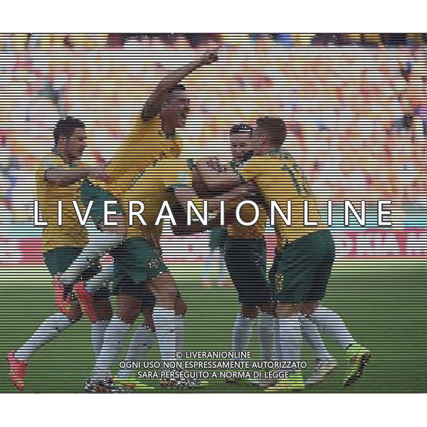 (140618) -- PORTO ALEGRE, June 18, 2014 () -- Australia\'s celebrate for a penalty goal of Mile Jedinak during a Group B match between Australia and Netherlands of 2014 FIFA World Cup at the Estadio Beira-Rio Stadium in Porto Alegre, Brazil, June 18, 2014.(/Li Ga)(pcy) ©PHOTOSHOT/Agenzia Aldo Liverani sas - ITALY ONLY - EDITORIAL USE ONLY - Australia v Olanda partita del Gruppo B Coppa del Mondo FIFA 2014 Estadio Beira -Rio Stadium di Porto Alegre, in Brasile, 18 Giugno 2014. Olanda ha vinto per 3-2 contro l\'Australia