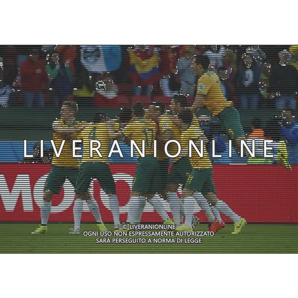 (140618) -- PORTO ALEGRE, June 18, 2014 () -- Australia\'s players celebrate a penalty goal during a Group B match between Australia and Netherlands of 2014 FIFA World Cup at the Estadio Beira-Rio Stadium in Porto Alegre, Brazil, June 18, 2014.(/Chen Jianli)(rh) ©PHOTOSHOT/Agenzia Aldo Liverani sas - ITALY ONLY - EDITORIAL USE ONLY - Australia v Olanda partita del Gruppo B Coppa del Mondo FIFA 2014 Estadio Beira -Rio Stadium di Porto Alegre, in Brasile, 18 Giugno 2014. Olanda ha vinto per 3-2 contro l\'Australia