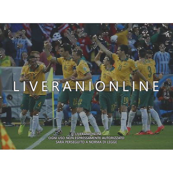 (140618) -- PORTO ALEGRE, June 18, 2014 () -- Australia\'s Mile Jedinak (3rd L) celebrates a penalty goal during a Group B match between Australia and Netherlands of 2014 FIFA World Cup at the Estadio Beira-Rio Stadium in Porto Alegre, Brazil, June 18, 2014.(/Chen Jianli)(rh) ©PHOTOSHOT/Agenzia Aldo Liverani sas - ITALY ONLY - EDITORIAL USE ONLY - Australia v Olanda partita del Gruppo B Coppa del Mondo FIFA 2014 Estadio Beira -Rio Stadium di Porto Alegre, in Brasile, 18 Giugno 2014. Olanda ha vinto per 3-2 contro l\'Australia