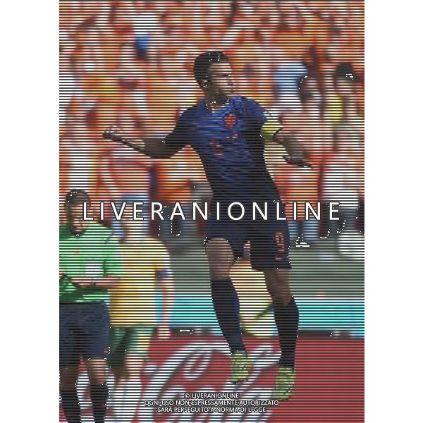 (140618) -- PORTO ALEGRE, June 18, 2014 () -- Netherlands\' Robin van Persie celebrates for his goal during a Group B match between Australia and Netherlands of 2014 FIFA World Cup at the Estadio Beira-Rio Stadium in Porto Alegre, Brazil, June 18, 2014.(/Li Ga)(pcy) ©PHOTOSHOT/Agenzia Aldo Liverani sas - ITALY ONLY - EDITORIAL USE ONLY - Australia v Olanda partita del Gruppo B Coppa del Mondo FIFA 2014 Estadio Beira -Rio Stadium di Porto Alegre, in Brasile, 18 Giugno 2014. Olanda ha vinto per 3-2 contro l\'Australia