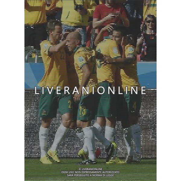 (140618) -- PORTO ALEGRE, June 18, 2014 () -- Australia\'s players celebrate the goal during a Group B match between Australia and Netherlands of 2014 FIFA World Cup at the Estadio Beira-Rio Stadium in Porto Alegre, Brazil, June 18, 2014.(/Chen Jianli)(rh) ©PHOTOSHOT/Agenzia Aldo Liverani sas - ITALY ONLY - EDITORIAL USE ONLY - Australia v Olanda partita del Gruppo B Coppa del Mondo FIFA 2014 Estadio Beira -Rio Stadium di Porto Alegre, in Brasile, 18 Giugno 2014. Olanda ha vinto per 3-2 contro l\'Australia