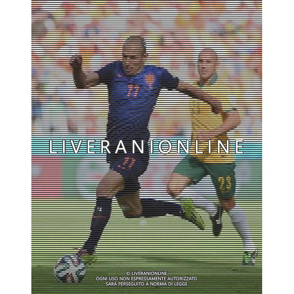 (140618) -- PORTO ALEGRE, June 18, 2014 () -- Netherlands\' Arjen Robben runs with the ball during a Group B match between Australia and Netherlands of 2014 FIFA World Cup at the Estadio Beira-Rio Stadium in Porto Alegre, Brazil, June 18, 2014.(/Li Ga)(pcy) ©PHOTOSHOT/Agenzia Aldo Liverani sas - ITALY ONLY - EDITORIAL USE ONLY - Australia v Olanda partita del Gruppo B Coppa del Mondo FIFA 2014 Estadio Beira -Rio Stadium di Porto Alegre, in Brasile, 18 Giugno 2014. Olanda ha vinto per 3-2 contro l\'Australia