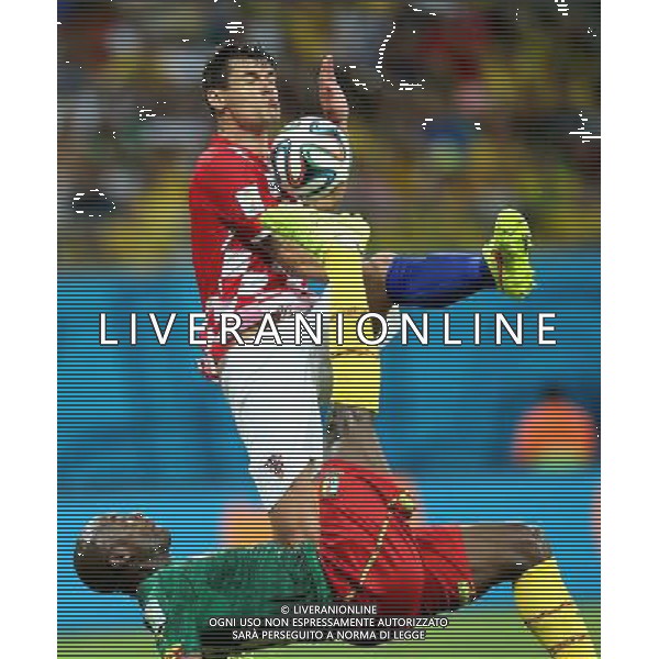 (140618) -- MANAUS, June 18, 2014 () -- Cameroon\'s Achille Webo makes an overhead kick during a Group A match between Cameroon and Croatia of 2014 FIFA World Cup at the Arena Amazonia Stadium in Manaus, Brazil, June 18, 2014. Croatia won 4-0 over Cameroon on Wednesday.(/Li Ming)(rh) AG ALDO LIVERANI SAS ONLY ITALY