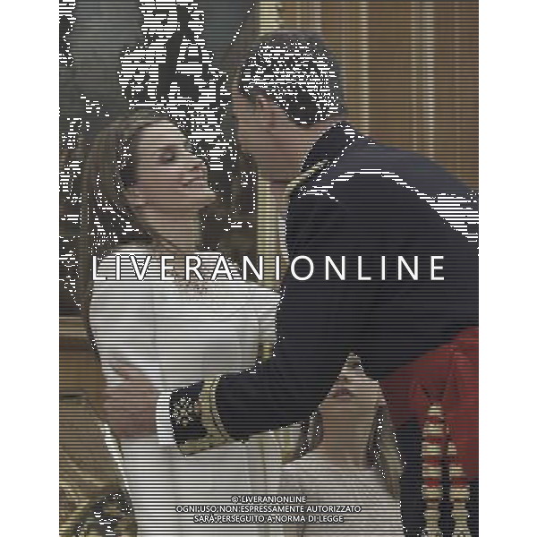 19.06.2014, Palacio de la Zarzuela, Madrid, ESP, Abdankung KË†nig Juan Carlos, KË†nig Juan Carlos ernennt seinen Sohn Felipe VI zum Oberbefehlshaber der spanischen Streitkrâ€°fte, im Bild Prince Felipe VI of Spain kissing his wife Princess Letizia of Spain // during the official ceremony to become chief commander of the spanish military forces. Kin Juan I of Spain abdicated on his son Felipe at the beginning of June. Palacio de la Zarzuela in Madrid, Spain on 2014/06/19. EXPA Pictures Â© 2014, PhotoCredit: EXPA/ Alterphotos/ EFE/Pool *****ATTENTION - OUT of ESP, SUI***** Â©photoshot/Agenzia Aldo Liverani sas - ITALY ONLY - EDITORIAL USE ONLY