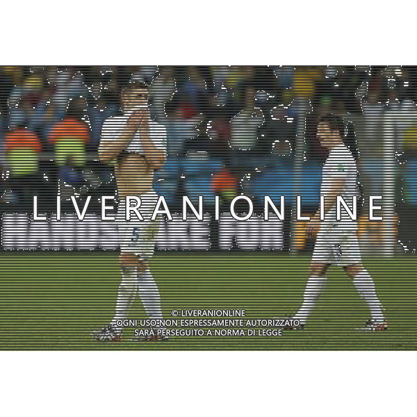 (140619) -- SAO PAULO, June 19, 2014 () -- England\'s Gary Cahill (L) and Leighton Baines leave the pitch after a Group D match between Uruguay and England of 2014 FIFA World Cup at the Arena de Sao Paulo Stadium in Sao Paulo, Brazil, June 19, 2014. Uruguay won 2-1 over England. (/Zhou Lei)(xzj) 2014 FIFA World Cup Brazil Group D match between Uruguay and England at Arena de Sao Paulo on June 19, 2014 in Sao Paulo, Brazil. ©photoshot/Agenzia Aldo Liverani sas - ITALY ONLY - EDITORIAL USE ONLY