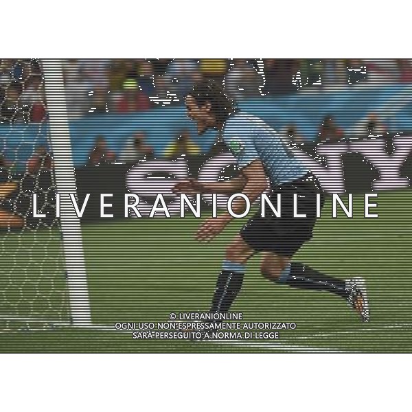 (140619) -- SAO PAULO, June 19, 2014 () -- Uruguay\'s Edinson Cavani reacts after he missed a chance during a Group D match between Uruguay and England of 2014 FIFA World Cup at the Arena de Sao Paulo Stadium in Sao Paulo, Brazil, June 19, 2014.Uruguay won 2-1 over England on Thursday.(/Li Ga)(pcy) 2014 FIFA World Cup Brazil Group D match between Uruguay and England at Arena de Sao Paulo on June 19, 2014 in Sao Paulo, Brazil. ©photoshot/Agenzia Aldo Liverani sas - ITALY ONLY - EDITORIAL USE ONLY
