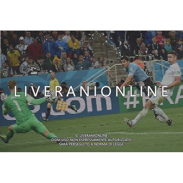 (140619) -- SAO PAULO, June 19, 2014 () -- Uruguay\'s Luis Suarez (C) shoots a goal during a Group D match between Uruguay and England of 2014 FIFA World Cup at the Arena de Sao Paulo Stadium in Sao Paulo, Brazil, June 19, 2014.Uruguay won 2-1 over England on Thursday.(/Li Ga)(pcy) 2014 FIFA World Cup Brazil Group D match between Uruguay and England at Arena de Sao Paulo on June 19, 2014 in Sao Paulo, Brazil. ©photoshot/Agenzia Aldo Liverani sas - ITALY ONLY - EDITORIAL USE ONLY