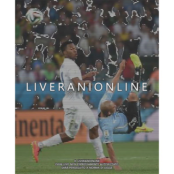 (140619) -- SAO PAULO, June 19, 2014 () -- Uruguay\'s Egidio Arevalo Rios (R) makes an overhead kick during a Group D match between Uruguay and England of 2014 FIFA World Cup at the Arena de Sao Paulo Stadium in Sao Paulo, Brazil, June 19, 2014.Uruguay won 2-1 over England on Thursday.(/Li Ga)(pcy) 2014 FIFA World Cup Brazil Group D match between Uruguay and England at Arena de Sao Paulo on June 19, 2014 in Sao Paulo, Brazil. ©photoshot/Agenzia Aldo Liverani sas - ITALY ONLY - EDITORIAL USE ONLY