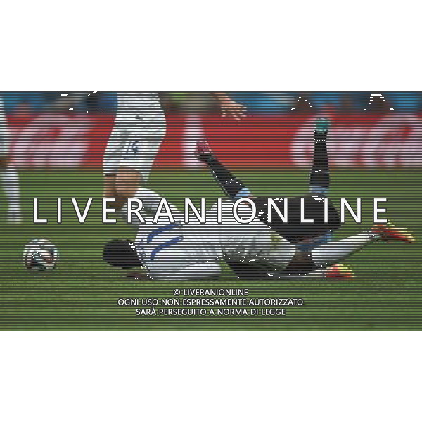 (140619) -- SAO PAULO, June 19, 2014 () -- England\'s Danny Welbeck (front) falls down in a competition during a Group D match between Uruguay and England of 2014 FIFA World Cup at the Arena de Sao Paulo Stadium in Sao Paulo, Brazil, June 19, 2014.Uruguay won 2-1 over England on Thursday.(/Li Ga)(pcy) 2014 FIFA World Cup Brazil Group D match between Uruguay and England at Arena de Sao Paulo on June 19, 2014 in Sao Paulo, Brazil. ©photoshot/Agenzia Aldo Liverani sas - ITALY ONLY - EDITORIAL USE ONLY