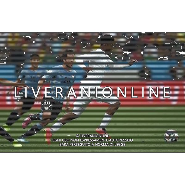 (140619) -- SAO PAULO, June 19, 2014 () -- England\'s Raheem Sterling (R) runs with the ball during a Group D match between Uruguay and England of 2014 FIFA World Cup at the Arena de Sao Paulo Stadium in Sao Paulo, Brazil, June 19, 2014.Uruguay won 2-1 over England on Thursday.(/Li Ga)(pcy) 2014 FIFA World Cup Brazil Group D match between Uruguay and England at Arena de Sao Paulo on June 19, 2014 in Sao Paulo, Brazil. ©photoshot/Agenzia Aldo Liverani sas - ITALY ONLY - EDITORIAL USE ONLY