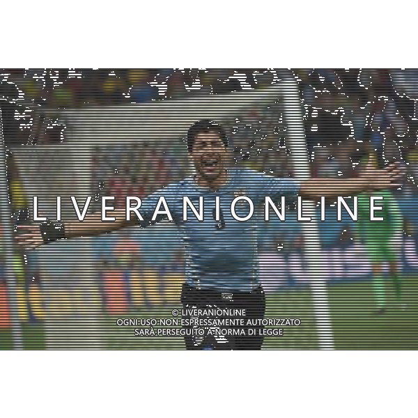 (140619) -- SAO PAULO, June 19, 2014 () -- Uruguay\'s Luis Suarez celebrates for his second goal during a Group D match between Uruguay and England of 2014 FIFA World Cup at the Arena de Sao Paulo Stadium in Sao Paulo, Brazil, June 19, 2014.Uruguay won 2-1 over England on Thursday.(/Li Ga)(pcy) 2014 FIFA World Cup Brazil Group D match between Uruguay and England at Arena de Sao Paulo on June 19, 2014 in Sao Paulo, Brazil. ©photoshot/Agenzia Aldo Liverani sas - ITALY ONLY - EDITORIAL USE ONLY