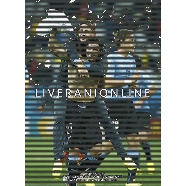 (140619) -- SAO PAULO, June 19, 2014 () -- Uruguay\'s Edinson Cavani (front) celebrates the victory after a Group D match between Uruguay and England of 2014 FIFA World Cup at the Arena de Sao Paulo Stadium in Sao Paulo, Brazil, June 19, 2014. Uruguay won 2-1 over England on Thursday.(/Chen Jianli)(rh) 2014 FIFA World Cup Brazil Group D match between Uruguay and England at Arena de Sao Paulo on June 19, 2014 in Sao Paulo, Brazil. ©photoshot/Agenzia Aldo Liverani sas - ITALY ONLY - EDITORIAL USE ONLY