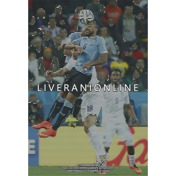 (140619) -- SAO PAULO, June 19, 2014 () -- Uruguay\'s Alvaro Pereira competes for a header with England\'s Rickie Lambert during a Group D match between Uruguay and England of 2014 FIFA World Cup at the Arena de Sao Paulo Stadium in Sao Paulo, Brazil, June 19, 2014. Uruguay won 2-1 over England on Thursday.(/Chen Jianli)(rh) 2014 FIFA World Cup Brazil Group D match between Uruguay and England at Arena de Sao Paulo on June 19, 2014 in Sao Paulo, Brazil. ©photoshot/Agenzia Aldo Liverani sas - ITALY ONLY - EDITORIAL USE ONLY