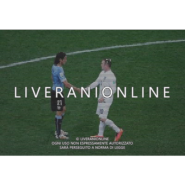 (140619) -- SAO PAULO, June 19, 2014 () -- Uruguay\'s Edinson Cavani shakes hands with England\'s Wayne Rooney during a Group D match between Uruguay and England of 2014 FIFA World Cup at the Arena de Sao Paulo Stadium in Sao Paulo, Brazil, June 19, 2014. Uruguay won 2-1 over England on Thursday.(/Liao Yujie)(rh) 2014 FIFA World Cup Brazil Group D match between Uruguay and England at Arena de Sao Paulo on June 19, 2014 in Sao Paulo, Brazil. ©photoshot/Agenzia Aldo Liverani sas - ITALY ONLY - EDITORIAL USE ONLY