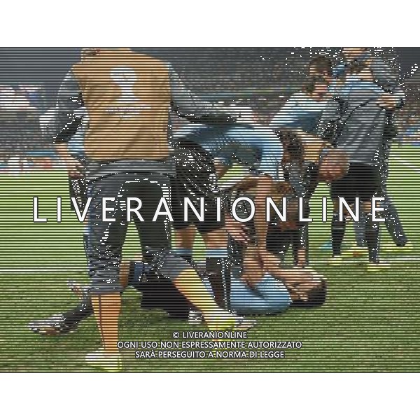 (140619) -- SAO PAULO, June 19, 2014 () -- Uruguay\'s Luis Suarez (down) celebrates for the victory with his teammates after a Group D match between Uruguay and England of 2014 FIFA World Cup at the Arena de Sao Paulo Stadium in Sao Paulo, Brazil, June 19, 2014.Uruguay won 2-1 over England on Thursday.(/Li Ga)(pcy) 2014 FIFA World Cup Brazil Group D match between Uruguay and England at Arena de Sao Paulo on June 19, 2014 in Sao Paulo, Brazil. ©photoshot/Agenzia Aldo Liverani sas - ITALY ONLY - EDITORIAL USE ONLY