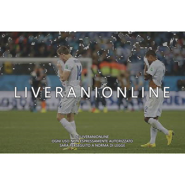 (140619) -- SAO PAULO, June 19, 2014 () -- England\'s Jordan Henderson (L) and Glen Johnson leave the pitch after a Group D match between Uruguay and England of 2014 FIFA World Cup at the Arena de Sao Paulo Stadium in Sao Paulo, Brazil, June 19, 2014. Uruguay won 2-1 over England. (/Zhou Lei)(xzj) 2014 FIFA World Cup Brazil Group D match between Uruguay and England at Arena de Sao Paulo on June 19, 2014 in Sao Paulo, Brazil. ©photoshot/Agenzia Aldo Liverani sas - ITALY ONLY - EDITORIAL USE ONLY