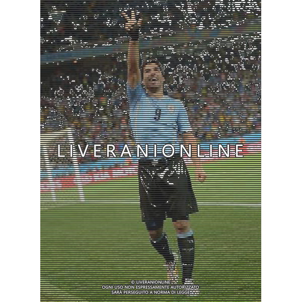 (140619) -- SAO PAULO, June 19, 2014 () -- Uruguay\'s Luis Suarez celebrates for his second goal during a Group D match between Uruguay and England of 2014 FIFA World Cup at the Arena de Sao Paulo Stadium in Sao Paulo, Brazil, June 19, 2014.Uruguay won 2-1 over England on Thursday.(/Li Ga)(pcy) 2014 FIFA World Cup Brazil Group D match between Uruguay and England at Arena de Sao Paulo on June 19, 2014 in Sao Paulo, Brazil. ©photoshot/Agenzia Aldo Liverani sas - ITALY ONLY - EDITORIAL USE ONLY