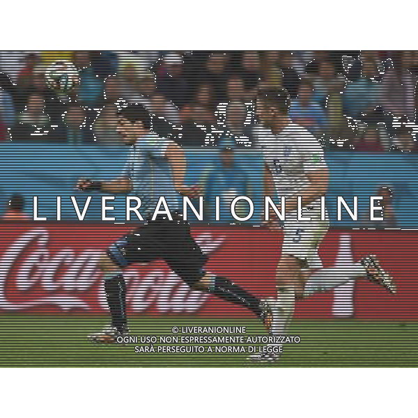 (140619) -- SAO PAULO, June 19, 2014 () -- Uruguay\'s Luis Suarez (L) runs with the ball during a Group D match between Uruguay and England of 2014 FIFA World Cup at the Arena de Sao Paulo Stadium in Sao Paulo, Brazil, June 19, 2014.(/Li Ga)(pcy) 2014 FIFA World Cup Brazil Group D match between Uruguay and England at Arena de Sao Paulo on June 19, 2014 in Sao Paulo, Brazil. ©photoshot/Agenzia Aldo Liverani sas - ITALY ONLY - EDITORIAL USE ONLY