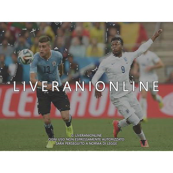 (140619) -- SAO PAULO, June 19, 2014 () -- England\'s Daniel Sturridge (R) vies with Uruguay\'s Jose Maria Gimenez during a Group D match between Uruguay and England of 2014 FIFA World Cup at the Arena de Sao Paulo Stadium in Sao Paulo, Brazil, June 19, 2014.(/Li Ga)(pcy) 2014 FIFA World Cup Brazil Group D match between Uruguay and England at Arena de Sao Paulo on June 19, 2014 in Sao Paulo, Brazil. ©photoshot/Agenzia Aldo Liverani sas - ITALY ONLY - EDITORIAL USE ONLY