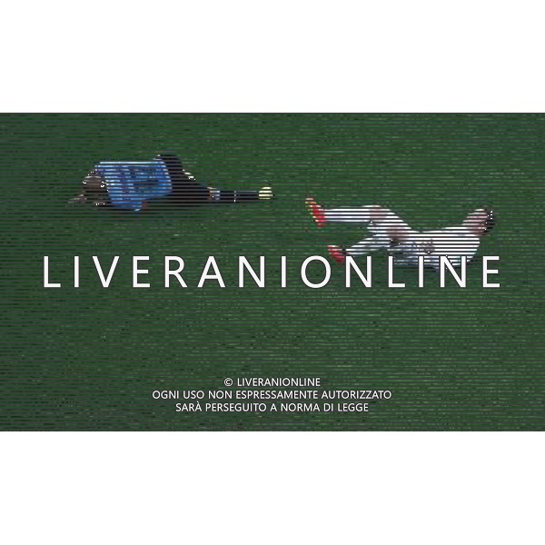 (140619) -- SAO PAULO, June 19, 2014 () -- Uruguay\'s Egidio Arevalo Rios and England\'s Wayne Rooney fall down on the field during a Group D match between Uruguay and England of 2014 FIFA World Cup at the Arena de Sao Paulo Stadium in Sao Paulo, Brazil, June 19, 2014.(/Liao Yujie)(rh) 2014 FIFA World Cup Brazil Group D match between Uruguay and England at Arena de Sao Paulo on June 19, 2014 in Sao Paulo, Brazil. ©photoshot/Agenzia Aldo Liverani sas - ITALY ONLY - EDITORIAL USE ONLY