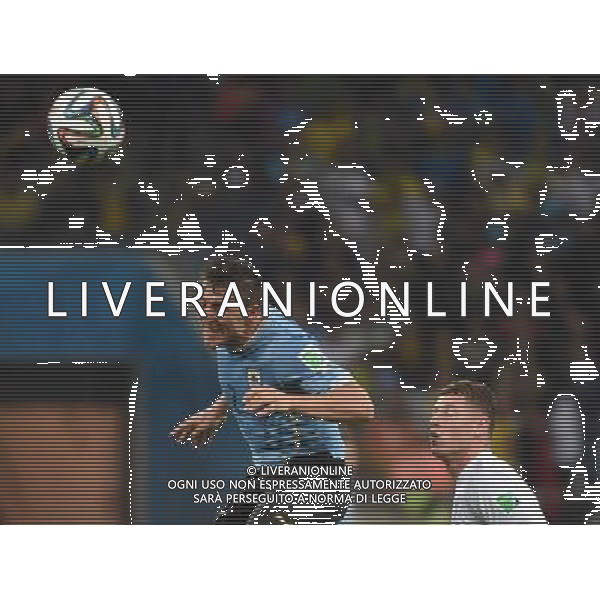 (140619) -- SAO PAULO, June 19, 2014 () -- Uruguay\'s Cristian Rodriguez (L) heads the ball during a Group D match between Uruguay and England of 2014 FIFA World Cup at the Arena de Sao Paulo Stadium in Sao Paulo, Brazil, June 19, 2014.(/Li Ga)(pcy) 2014 FIFA World Cup Brazil Group D match between Uruguay and England at Arena de Sao Paulo on June 19, 2014 in Sao Paulo, Brazil. ©photoshot/Agenzia Aldo Liverani sas - ITALY ONLY - EDITORIAL USE ONLY