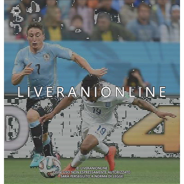 (140619) -- SAO PAULO, June 19, 2014 () -- England\'s Raheem Sterling (R) vies with Uruguay\'s Cristian Rodriguez during a Group D match between Uruguay and England of 2014 FIFA World Cup at the Arena de Sao Paulo Stadium in Sao Paulo, Brazil, June 19, 2014.(/Li Ga)(pcy) 2014 FIFA World Cup Brazil Group D match between Uruguay and England at Arena de Sao Paulo on June 19, 2014 in Sao Paulo, Brazil. ©photoshot/Agenzia Aldo Liverani sas - ITALY ONLY - EDITORIAL USE ONLY