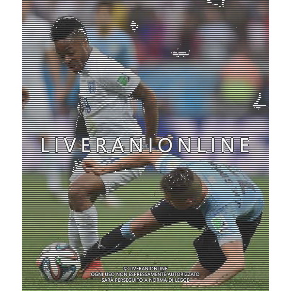 (140619) -- SAO PAULO, June 19, 2014 () -- England\'s Raheem Sterling (L) vies with Uruguay\'s Jose Maria Gimenez during a Group D match between Uruguay and England of 2014 FIFA World Cup at the Arena de Sao Paulo Stadium in Sao Paulo, Brazil, June 19, 2014.(/Li Ga)(pcy) 2014 FIFA World Cup Brazil Group D match between Uruguay and England at Arena de Sao Paulo on June 19, 2014 in Sao Paulo, Brazil. ©photoshot/Agenzia Aldo Liverani sas - ITALY ONLY - EDITORIAL USE ONLY