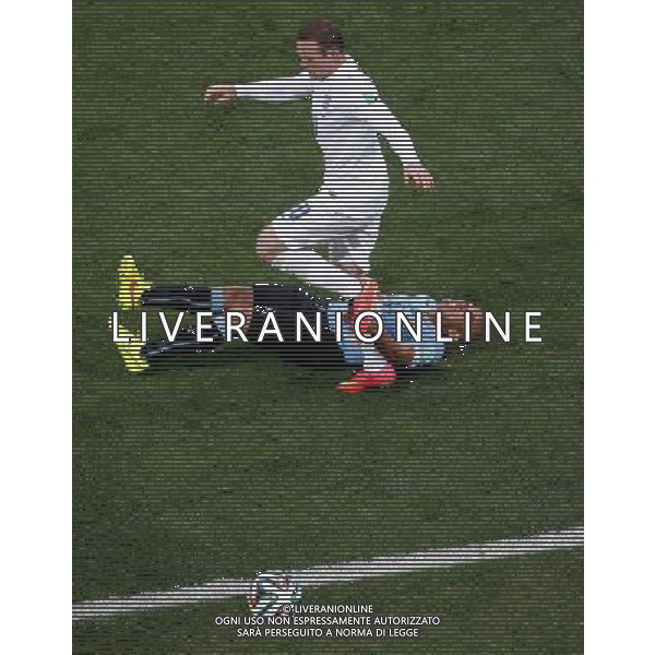 (140619) -- SAO PAULO, June 19, 2014 () -- Uruguay\'s Cristian Stuani falls down as he competes with England\'s Wayne Rooney during a Group D match between Uruguay and England of 2014 FIFA World Cup at the Arena de Sao Paulo Stadium in Sao Paulo, Brazil, June 19, 2014.(/Liao Yujie)(rh) 2014 FIFA World Cup Brazil Group D match between Uruguay and England at Arena de Sao Paulo on June 19, 2014 in Sao Paulo, Brazil. ©photoshot/Agenzia Aldo Liverani sas - ITALY ONLY - EDITORIAL USE ONLY