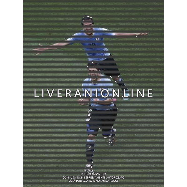 (140619) -- SAO PAULO, June 19, 2014 () -- Uruguay\'s Luis Suarez (front) celebrates for a goal during a Group D match between Uruguay and England of 2014 FIFA World Cup at the Arena de Sao Paulo Stadium in Sao Paulo, Brazil, June 19, 2014.(/Liao Yujie)(rh) 2014 FIFA World Cup Brazil Group D match between Uruguay and England at Arena de Sao Paulo on June 19, 2014 in Sao Paulo, Brazil. ©photoshot/Agenzia Aldo Liverani sas - ITALY ONLY - EDITORIAL USE ONLY