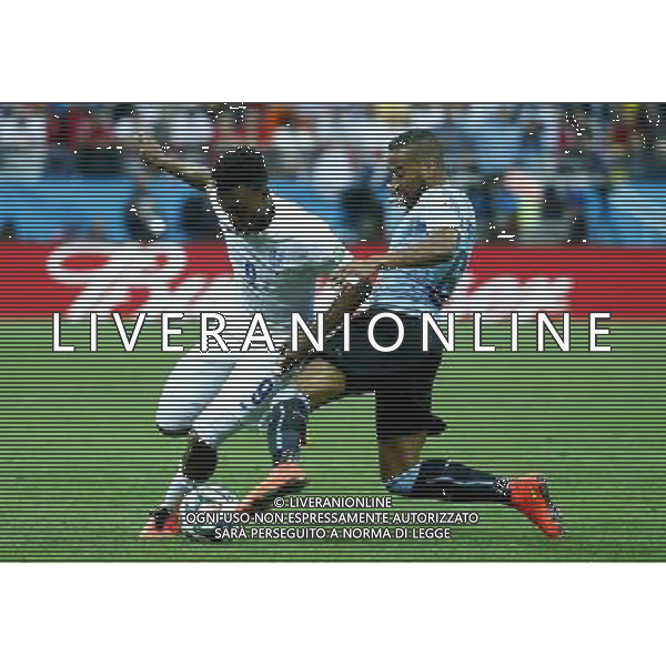 (140619) -- SAO PAULO, June 19, 2014 () -- Uruguay\'s Alvaro Pereira vies with England\'s Daniel Sturridge during a Group D match between Uruguay and England of 2014 FIFA World Cup at the Arena de Sao Paulo Stadium in Sao Paulo, Brazil, June 19, 2014.(/Chen Jianli)(rh) 2014 FIFA World Cup Brazil Group D match between Uruguay and England at Arena de Sao Paulo on June 19, 2014 in Sao Paulo, Brazil. ©photoshot/Agenzia Aldo Liverani sas - ITALY ONLY - EDITORIAL USE ONLY
