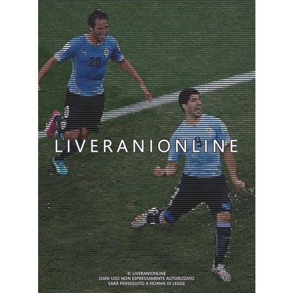 (140619) -- SAO PAULO, June 19, 2014 () -- Uruguay\'s Luis Suarez (R) celebrates for a goal during a Group D match between Uruguay and England of 2014 FIFA World Cup at the Arena de Sao Paulo Stadium in Sao Paulo, Brazil, June 19, 2014.(/Liao Yujie)(rh) 2014 FIFA World Cup Brazil Group D match between Uruguay and England at Arena de Sao Paulo on June 19, 2014 in Sao Paulo, Brazil. ©photoshot/Agenzia Aldo Liverani sas - ITALY ONLY - EDITORIAL USE ONLY