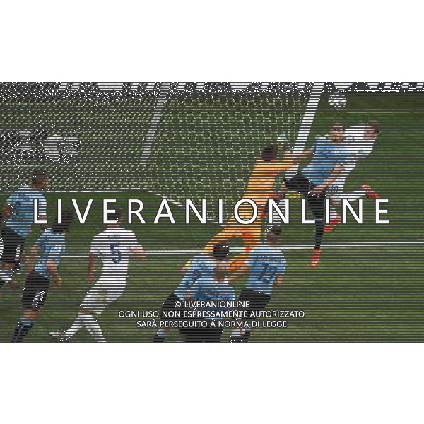 (140619) -- SAO PAULO, June 19, 2014 () -- England\'s Wayne Rooney (1st R) shoots a header during a Group D match between Uruguay and England of 2014 FIFA World Cup at the Arena de Sao Paulo Stadium in Sao Paulo, Brazil, June 19, 2014.(/Liao Yujie)(rh) 2014 FIFA World Cup Brazil Group D match between Uruguay and England at Arena de Sao Paulo on June 19, 2014 in Sao Paulo, Brazil. ©photoshot/Agenzia Aldo Liverani sas - ITALY ONLY - EDITORIAL USE ONLY